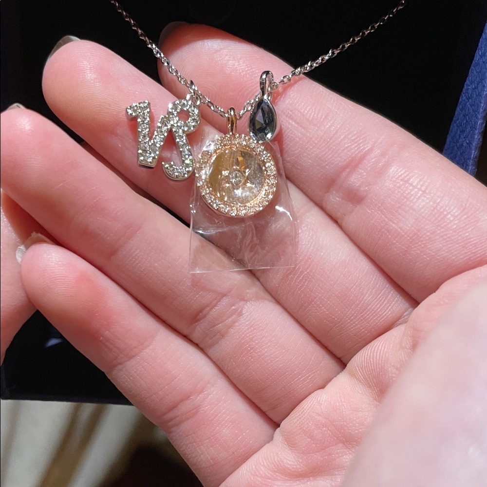 Swarovski Rhodium Capricorn Zodiac sign  with sundial and tear drop gem.